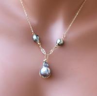 South Sea, 2 Tahitian Pearl A67 by Razie Blakley